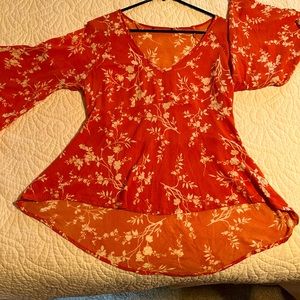 Orange colored blouse